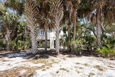 Tucked away on a private waterfront peninsula in historic Cedar - photo 34
