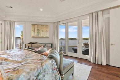 This 5BR Trillium estate redefines lake living. Over 850 ft of - photo 38