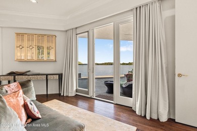 This 5BR Trillium estate redefines lake living. Over 850 ft of - photo 39