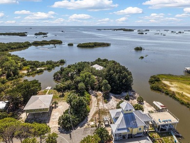 Tucked away on a private waterfront peninsula in historic Cedar - photo 44