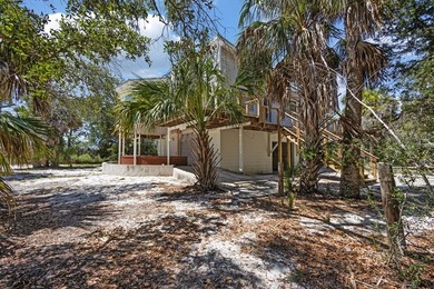 Tucked away on a private waterfront peninsula in historic Cedar - photo 49