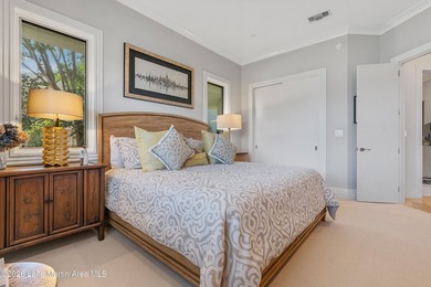 This 5BR Trillium estate redefines lake living. Over 850 ft of - photo 50
