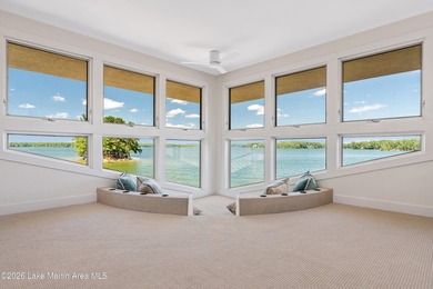 This 5BR Trillium estate redefines lake living. Over 850 ft of - photo 52