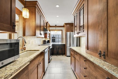 Lovingly maintained by only two owners, this Whitefish Bay home - photo 9