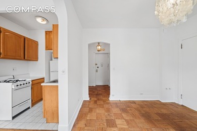 This 6th-floor walk-up features south-facing, floor-to-ceiling - photo 8