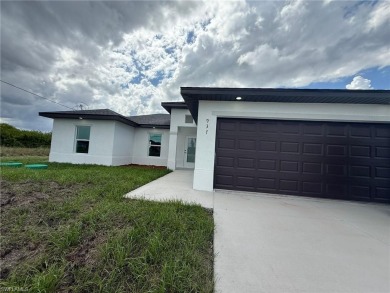 Lake Home For Sale in Lehigh Acres, Florida