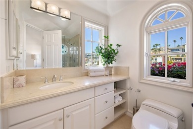 Overlooking the channel entrance, this waterfront home is - photo 19
