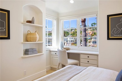 Overlooking the channel entrance, this waterfront home is - photo 21
