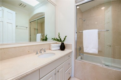 Overlooking the channel entrance, this waterfront home is - photo 22