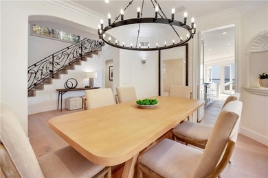 Overlooking the channel entrance, this waterfront home is - photo 29