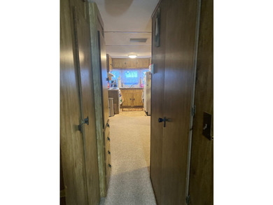 Title in hand! You own the trailer and land with no lot rent or - photo 3