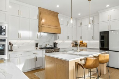Located in The Tribute, 8760 Scottys Lake Lane combines elegant - photo 2