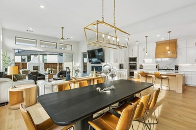Located in The Tribute, 8760 Scottys Lake Lane combines elegant - photo 4