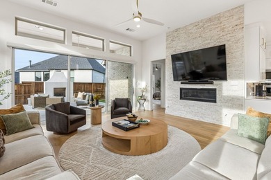 Located in The Tribute, 8760 Scottys Lake Lane combines elegant - photo 5
