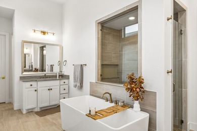 Located in The Tribute, 8760 Scottys Lake Lane combines elegant - photo 7