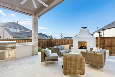Located in The Tribute, 8760 Scottys Lake Lane combines elegant - photo 8