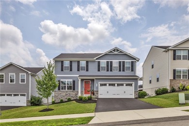 Welcome home to this better-than-new gem in the sought-after - photo 1