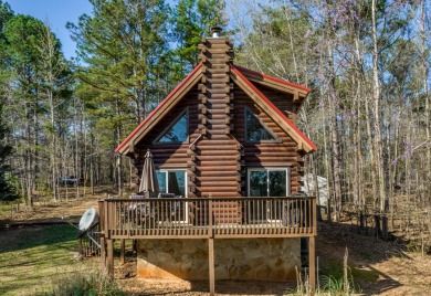 CUTE! CUTE! CUTE! Don't miss this adorable cabin located on over  - Lake Home SOLD! in Sparta, Georgia