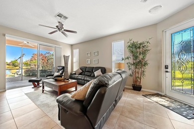 Welcome to this well-kept Georgian model home in the gated - photo 3