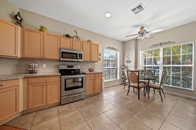 Welcome to this well-kept Georgian model home in the gated - photo 10