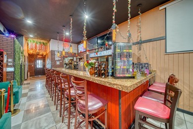 Consisting of about 1,500 Sq Ft, the space features A Full Bar - photo 1