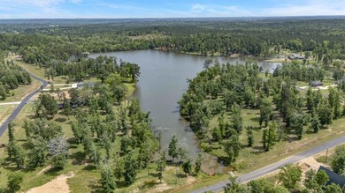 Lake life is calling! This beautiful corner, waterfront lot in - photo 9