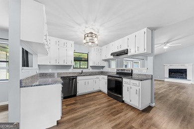 Plenty of space welcomes you in this 4/5 bedroom 2.5 bath home - photo 11