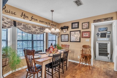 Nestled on a hill, this charming 4-bedroom, 2.5-bath home is - photo 11