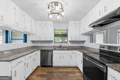 Plenty of space welcomes you in this 4/5 bedroom 2.5 bath home - photo 12