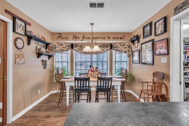 Nestled on a hill, this charming 4-bedroom, 2.5-bath home is - photo 12
