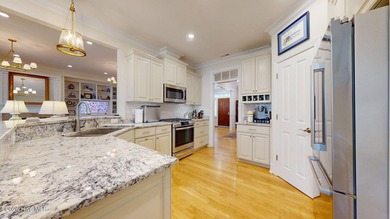Tucked away at the end of a quiet cul-de-sac, this custom-built - photo 2