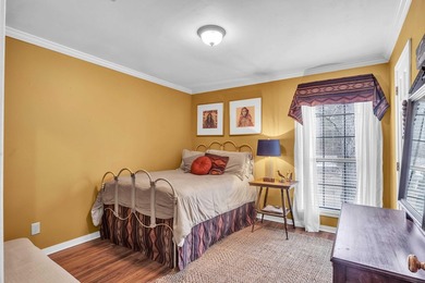 Nestled on a hill, this charming 4-bedroom, 2.5-bath home is - photo 19