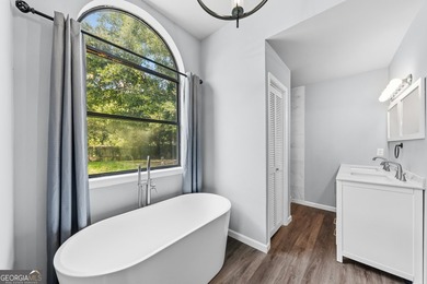 Plenty of space welcomes you in this 4/5 bedroom 2.5 bath home - photo 24