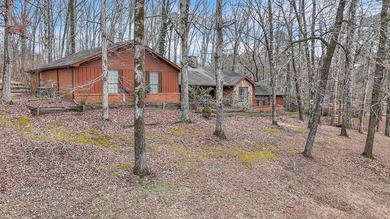 Nestled on a hill, this charming 4-bedroom, 2.5-bath home is - photo 29