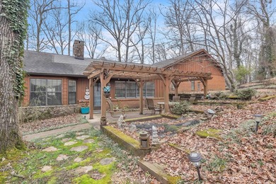 Nestled on a hill, this charming 4-bedroom, 2.5-bath home is - photo 30