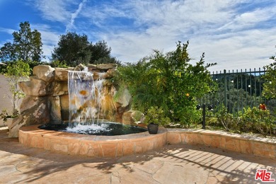 Located in the prestigious Bellagio Community, this elegant - photo 32