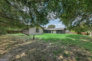 Plenty of space welcomes you in this 4/5 bedroom 2.5 bath home - photo 38