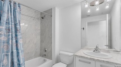 A must-see corner residence at Vizcayne Condominium featuring