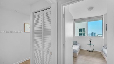 A must-see corner residence at Vizcayne Condominium featuring