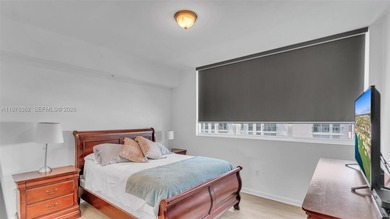 A must-see corner residence at Vizcayne Condominium featuring