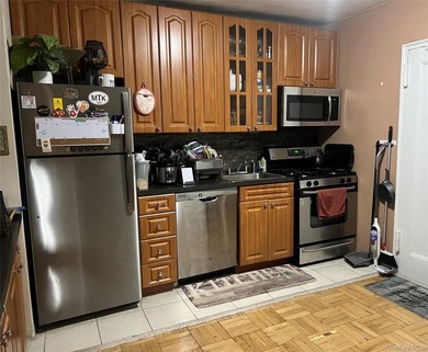Welcome to this spacious and well-maintained first-floor - photo 1