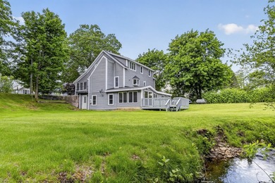 This quintessential Coastal Maine Bungalow is located minutes - photo 6