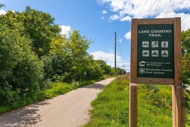 Share neighborhood access to Pewaukee Lake while enjoying the - photo 3