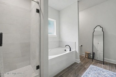 This beautiful home in the Shieldsboro community offers a - photo 17