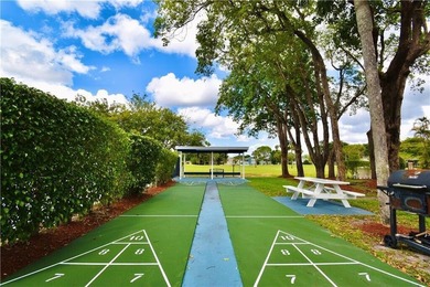 Bright and Stunning Corner unit with lake & Golf views, located