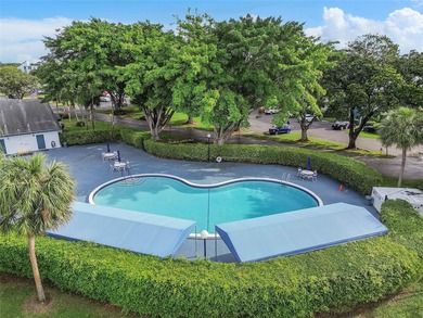 Bright and Stunning Corner unit with lake & Golf views, located