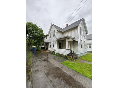 Investment Opportunity: Duplex with Potential in Rochester! - photo 1