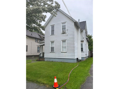 Investment Opportunity: Duplex with Potential in Rochester! - photo 2
