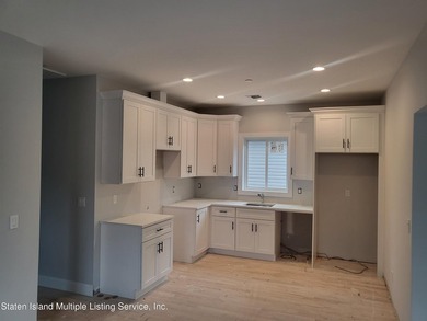 BRAND NEW CONSTRUCTION 6 OVER 6. LEVEL 1: MBR SUITE WITH 3/4 - photo 9