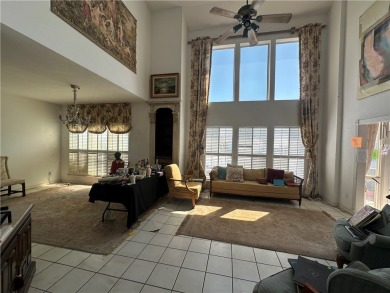 Nestled along a wide canal in Corpus Christi, this 3-bedroom, 2